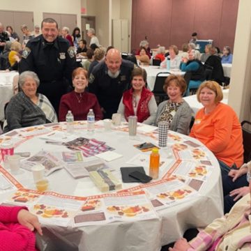 Boston Police and Elders Celebrate Togetherness at Thanksgiving Luncheon Event