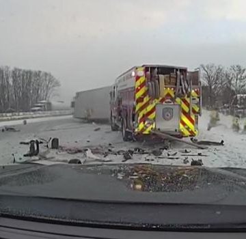 Dashcam video shows box truck crashing into first responder vehicles on side of road in Southwest Michigan