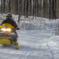 Illinois Man Dies After Snowmobile Collides With Powerline Structure in Northern Michigan, Woman Seriously Injured