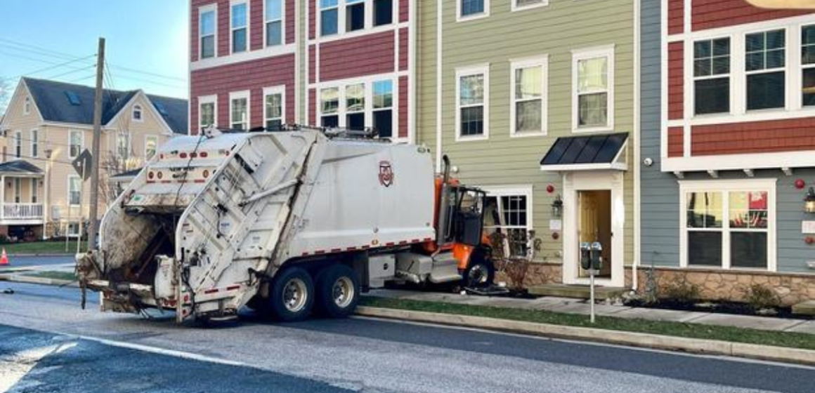 Towson Building Struck by Trash Truck in Early Morning Accident