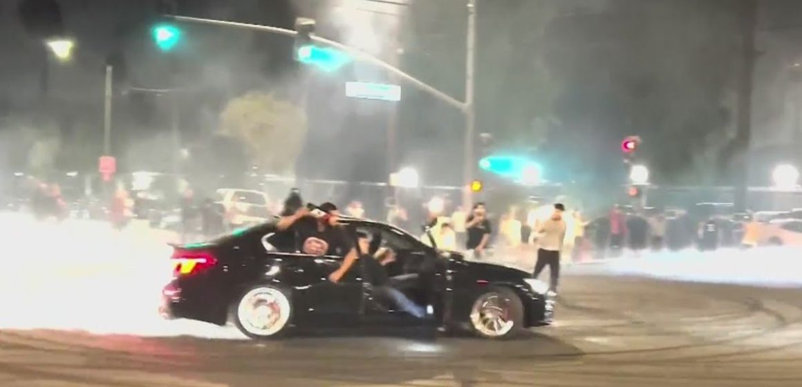 Dangerous New Year’s Celebration in La Cars Spin Donuts Near Explosive Fireworks Display