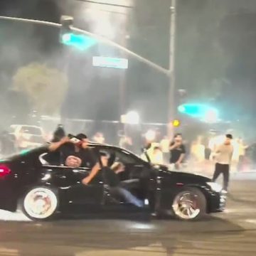 Dangerous New Year’s Celebration in La Cars Spin Donuts Near Explosive Fireworks Display