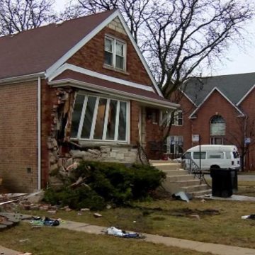 Car Crashes into Chicago Residence, Occupants of Crashed SUV Escape Before Police Arrive